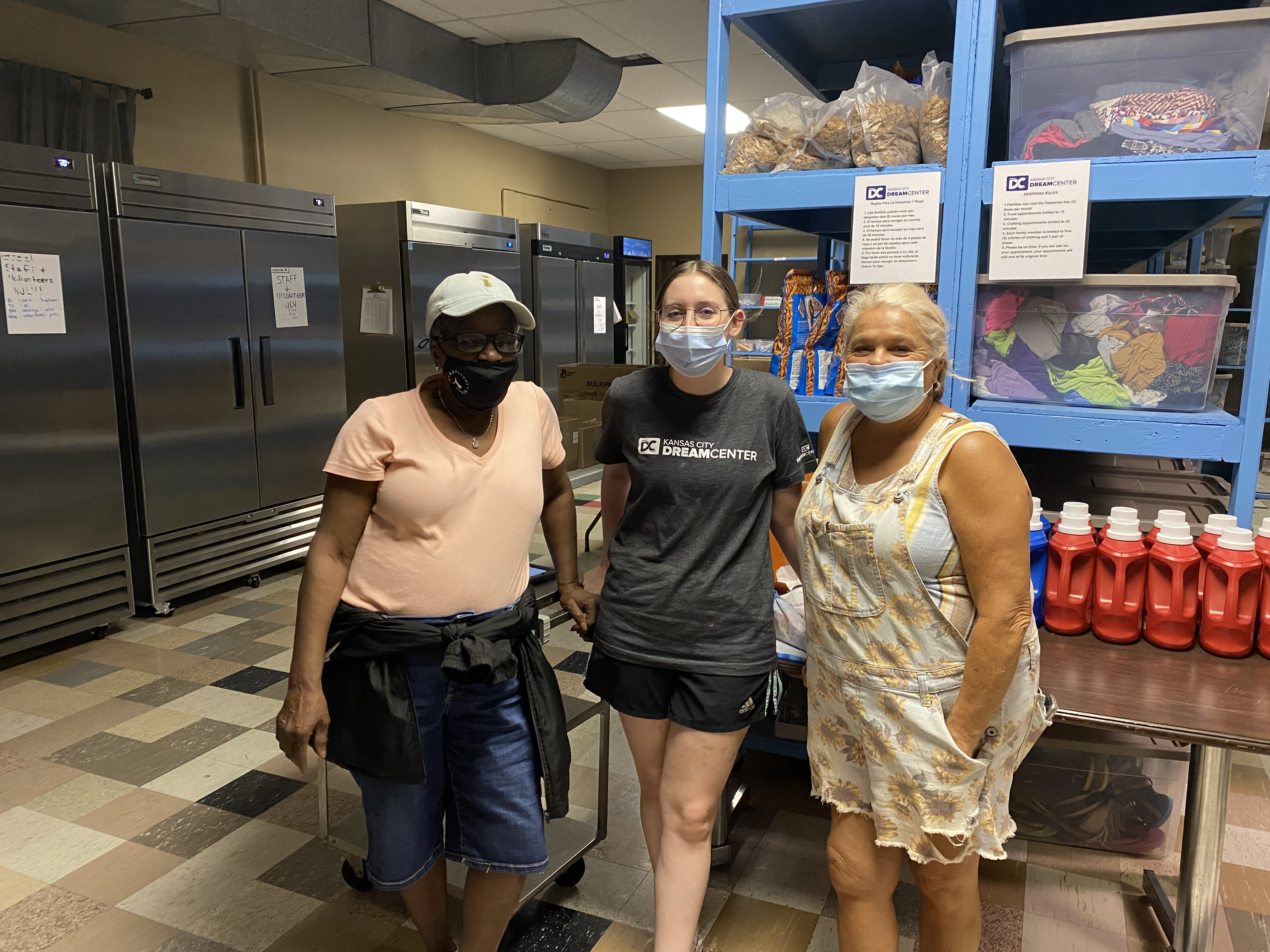 Staff and community members in the clothing pantry.