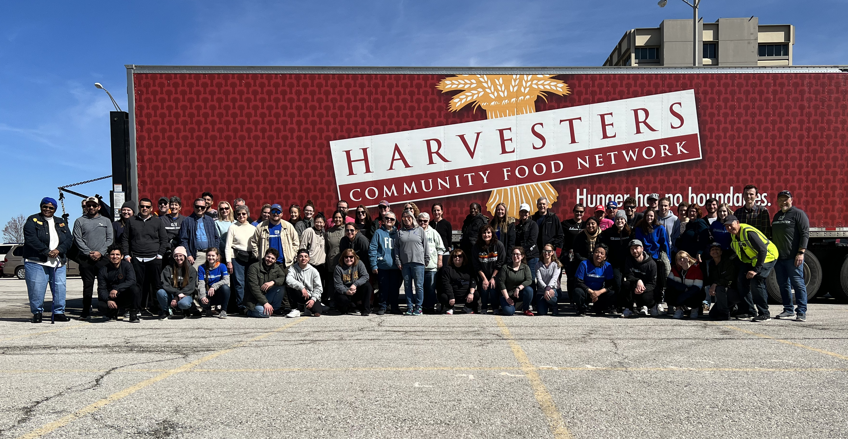 Group picture of volunteers with Harvesters Community Food Network and Kansas City Dream Center.