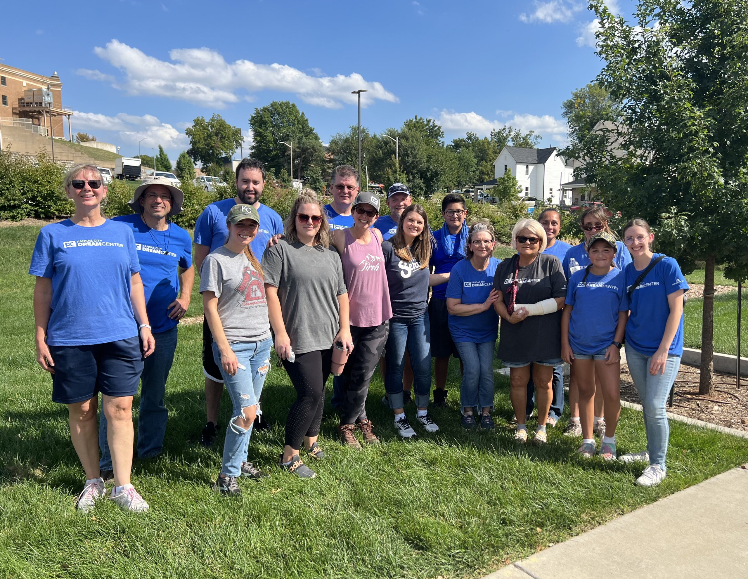 Kansas City Dream Center staff and volunteers in a park for a group photo.